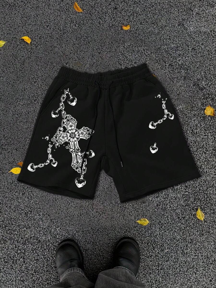 Manfinity EMRG 男士短裤,饰有缠绕链条、复古十字架图案和心形锁元素,展现信仰与反叛、暗黑风格、美式街头风,适合音乐节穿着。 - 黑色 - 查看 1