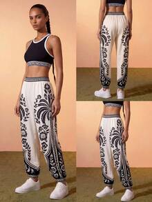 CAJUNI Women's Bohemian Floral Print Elastic Waist Drawstring Fashion Sweatpants - Black and White - View 4