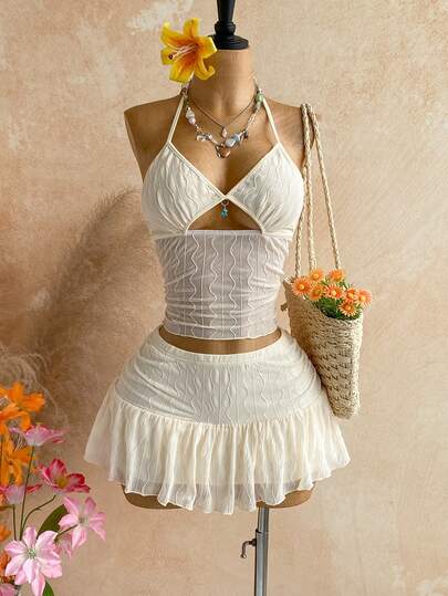 Soleia Bộ đồ 2 món dành cho nữ, màu trơn, gợi cảm, dây mảnh, thiết kế khoét lỗ, gồm áo hai dây và chân váy ngắn.