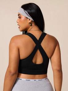SHEIN Rhythm Era Sujetador deportivo sin costuras de alta elasticidad para mujeres de talla grande - Negro - Ver 1
