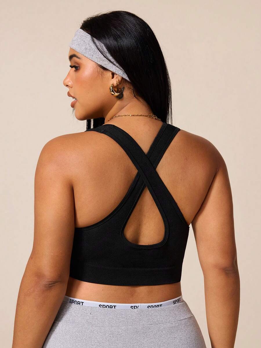 SHEIN Rhythm Era Sujetador deportivo sin costuras de alta elasticidad para mujeres de talla grande - Negro - Ver 1