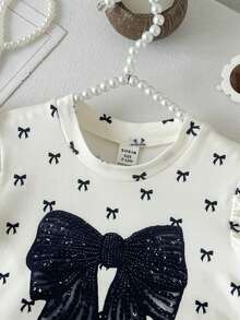 女婴夏季休闲优雅蝴蝶结印花荷叶边上衣和网纱裙套装 - 杏色 - 查看 3