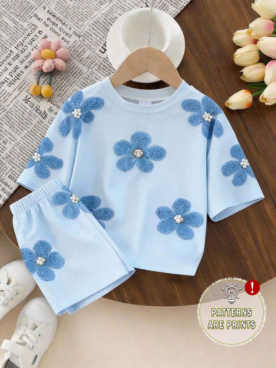SHEIN 1 Set Niñas Bebé Casual Cómodo Moda Dulce Lindo Estampado Floral Camiseta de Manga Corta y Conjunto de Pantalones Cortos, Atuendos de Primavera a Verano, Conjunto de Verano Fresco Color Azul Claro - Multicolor - Ver 1