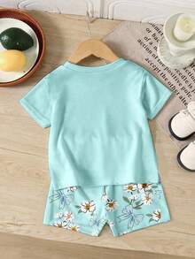 Bộ 2 món áo thun ngắn tay và quần short thể thao thường ngày cho bé gái, thích hợp cho mùa hè, thể thao, hoạt động ngoài trời, kỳ nghỉ, đạp xe, đi học, trang phục cho bé gái với nơ trang trí và họa tiết hoa màu xanh da trời nhạt. - Nhiều màu - Xem 3
