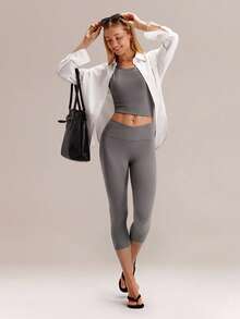 GLOWMODE Quần legging lửng FeatherFit™ 21 inch với cạp chéo hình chữ Y và đường may ở mông, kiểu dáng dễ thương, thích hợp cho yoga, pilates và các hoạt động hàng ngày. - Volcanic Gray - Xem 8