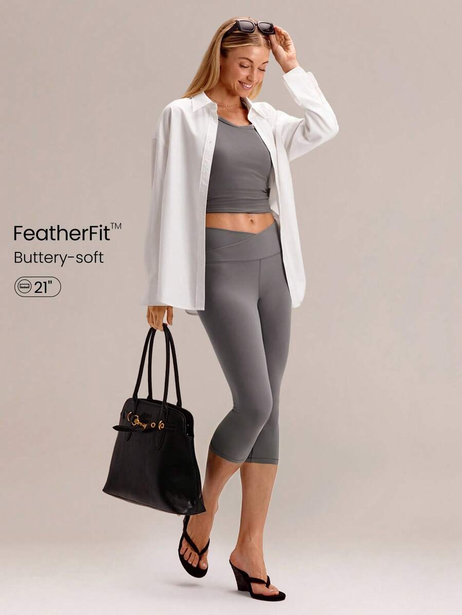 GLOWMODE Quần legging lửng FeatherFit™ 21 inch với cạp chéo hình chữ Y và đường may ở mông, kiểu dáng dễ thương, thích hợp cho yoga, pilates và các hoạt động hàng ngày. - Volcanic Gray - Xem 1