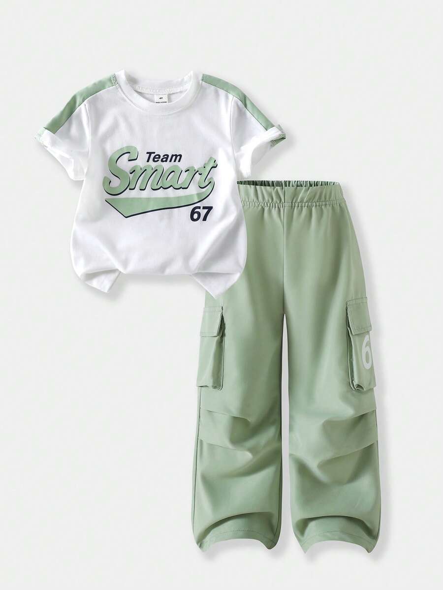 SHEIN Casuvi Kids Bộ 2 món cho bé gái: Áo thun tay ngắn cổ tròn dáng rộng phối màu tương phản kiểu retro in chữ Mỹ dễ thương + Quần cargo màu xanh nhạt, trang phục thời trang mùa hè thích hợp ở nhà, du lịch, thể thao, hoạt động ngoài trời và mặc hàng ngày. - Màu xanh Bạc hà - Xem 1
