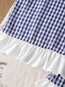 Bộ đồ cho bé gái tuổi teen: Áo không tay kẻ caro có bèo nhún và nơ trang trí, kèm quần short. - Nhiều màu - Xem 6
