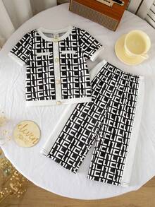 SHEIN 2 piezas Conjunto de camiseta de manga corta con estampado floral para niñas bebé - Negro - Ver 2