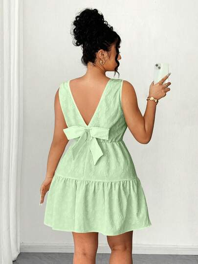 Elenzga Đầm chữ A xếp ly ngọt ngào dành cho nữ cỡ lớn với thiết kế nơ jacquard phía sau, kiểu dáng nghỉ dưỡng, chất liệu jacquard họa tiết hoa không tay, thích hợp cho mặc hàng ngày, đi chơi với bạn bè, mua sắm cuối tuần, tiệc mùa hè, tiệc ngoài trời, du lịch nghỉ lễ.