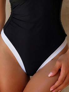 Swim Chiccia Áo tắm một mảnh hở lưng gợi cảm phối màu trang trí kim loại dành cho nữ, thích hợp cho kỳ nghỉ biển. - Đen và trắng - Xem 3