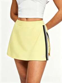 Eassivo Falda deportiva para mujer con pantalón corto incorporado, falda de tenis con abertura frontal de color contrastante, cintura alta con control de abdomen, alta elasticidad - Butter Yellow - Ver 1