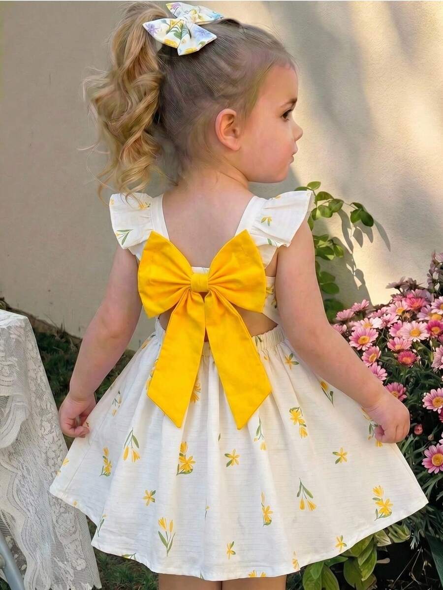 LMoss Kids Vestido con mangas de vuelo con estampado de lazo y bloques de color, vestido de verano floral amarillo para bebé niña, vestido floral amarillo y blanco para bebé niña, vestido floral de primavera para niñas - Amarillo - Ver 1