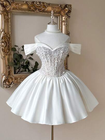 Lovelzi Elegant, Glamorous, Romantic, And Stylish White Lace And Sequined Trim In Luxurious Satin. Handmade Pearl Embellishments, Off-The-Shoulder Design, Bubble Skirt With Multiple Boning Details, A-Line Silhouette, Short Length. Suitable For All Occasions. A Glamorous Party Dress, Bridal Gown, Or Wedding Dress (Heavy-Work).