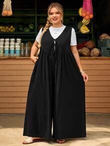 SHEIN CURVE+ Mono sin mangas con bolsillos con lazo delantero para mujer de talla grande, corte holgado - Negro - Ver 9