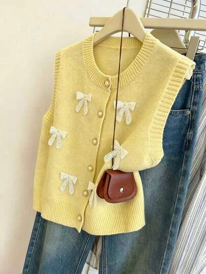 SHEIN Franclia Áo len nữ mùa xuân/hè dáng rộng, cổ tròn, không tay, họa tiết bướm, cúc kim loại.