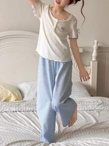 Dazy Kids Bộ đồ mặc nhà 2 món cho bé gái tuổi teen, áo thun ngắn tay cổ tròn thêu nơ và quần dài, thích hợp cho mùa thu. - Màu xanh lam - Xem 6
