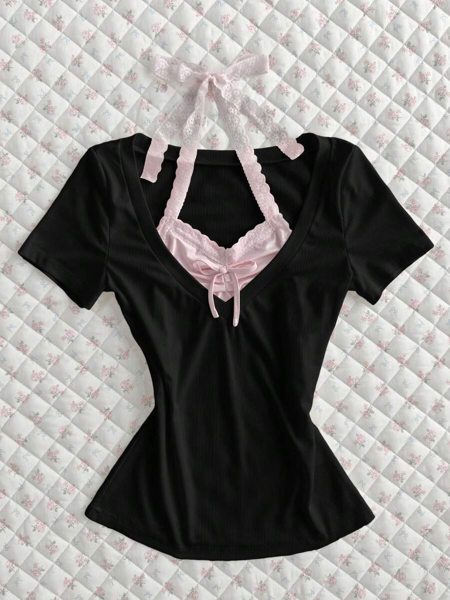 Flirla Camiseta ajustada de manga corta con volantes, parches de color contrastante y lazo, de estilo estriado blanco. Prenda versátil y elegante para uso diario, oficina y viajes, ideal para primavera/verano - Negro - Ver 1
