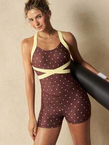 VARSITIE Bộ jumpsuit thể thao ôm sát, hở lưng, in chấm bi. - Nhiều màu - Xem 6