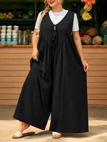 SHEIN CURVE+ Mono sin mangas con bolsillos con lazo delantero para mujer de talla grande, corte holgado - Negro - Ver 6