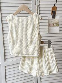 SHEIN Bộ đồ mùa hè thoải mái cho bé gái, chất liệu dệt kim jacquard họa tiết hoa 3D, gồm áo hai dây và quần short, họa tiết hoa 3D, kiểu dáng ôm sát, thích hợp cho kỳ nghỉ. - Màu be - Xem 7
