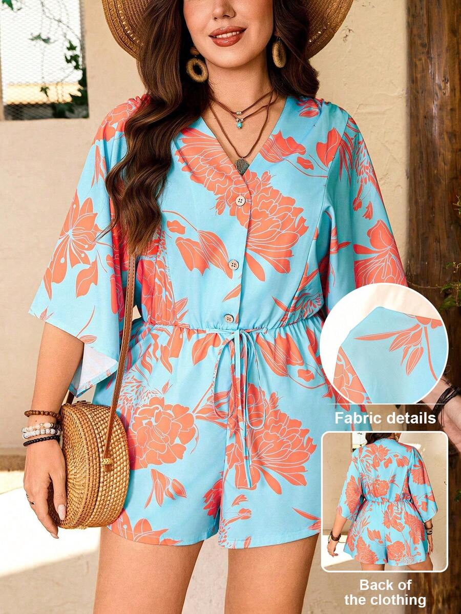 Breezaya Bộ jumpsuit cỡ lớn dành cho nữ, in họa tiết hoa rực rỡ, cổ chữ V màu cam, cài nút gỗ và thắt eo, kiểu dáng thanh lịch, thoải mái, đa năng cho kỳ nghỉ xuân/hè. Bộ đồ đi nghỉ mát cho nữ, quần áo mùa hè cho nữ, bộ 2 mảnh liền thân cho nữ đi nghỉ mát. - Màu xanh lam - Xem 1