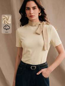 Áo thun nữ Anewsta màu mơ, chất liệu cotton pha 74%, cổ bẻ, thắt eo, tay ngắn, ôm dáng, phối vải denim, kiểu dáng thanh lịch, tối giản, phù hợp mặc hàng ngày hoặc đi làm. - Màu be - Xem 6