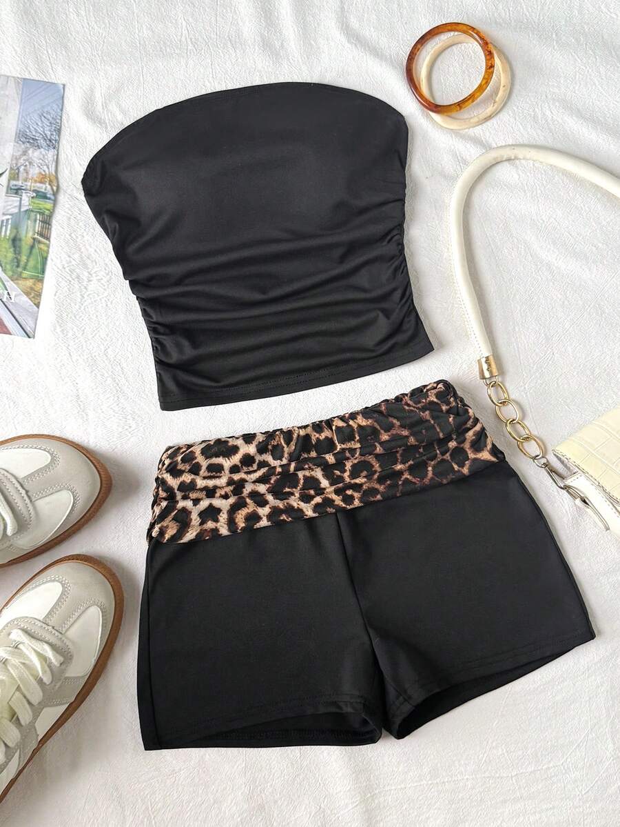 SHEIN Bộ đồ thể thao tối giản, thoải mái, co giãn, màu trơn dành cho bé gái tuổi teen gồm áo tank top và quần short in họa tiết da báo với cạp quần tương phản, màu đen. - màu đen - Xem 1
