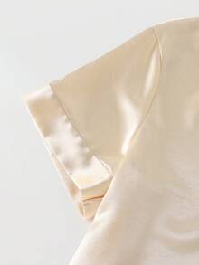 GlowEve CURVE Plus Size Women's Elegant Champagne Summer Formal Work Satin Blouse,French Office V-Neck Short Sleeve Pullover,Luxurious Knot Metal Button Decor Top - Apricot - View 7