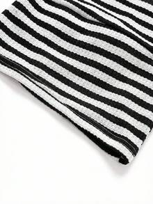 SHEIN Conjunto de 2 piezas de camiseta acanalada con estampado floral y leggings para niñas preadolescentes, moda casual versátil para uso diario - Blanco y Negro - Ver 3