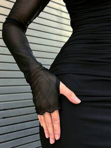 Yohana Edit 1 pièce Robe ajourée à manches longues en tricot pour les vacances - Noir - Voir 3