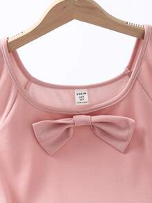 Pitira Robe rose à col rond et coupe évasée avec décoration de nœud 3D pour jeunes filles, ourlet à volants mi-genoux, robe élégante et mignonne convenant pour les fêtes, les mariages et les occasions formelles - Rose bonbon - Voir 5