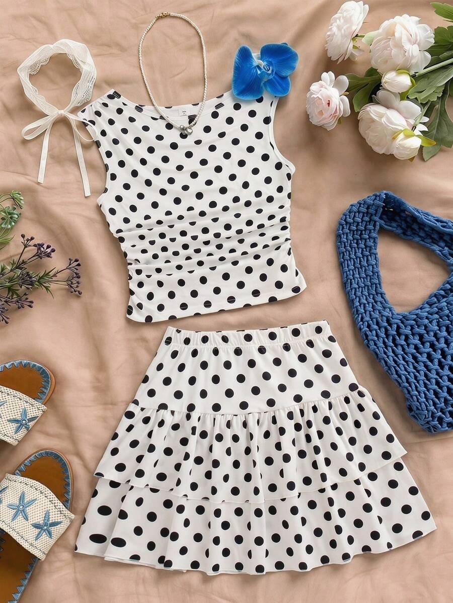 SHEIN Sparklyn 这款全新两件套少女套装包含一件时尚休闲的舒适弹力针织提花蓝色圆领套头背心,搭配同色系双层蛋糕裙。背心的腰部和下摆采用褶裥设计,打造优雅整体造型。这款高品质套装适合日常穿着,也适合度假、旅行和派对等场合,是春夏的理想之选。 - 白色 - 查看 1