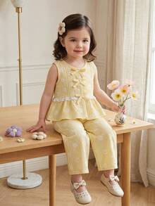 Souflis Souflis 2 piezas Conjunto de niña bebé con blusa de cuello redondo sin mangas plisada de color amarillo claro, top con decoración de lazo y pantalón de cintura elástica, cómodo y lindo para primavera, verano y otoño - Amarillo - Ver 1
