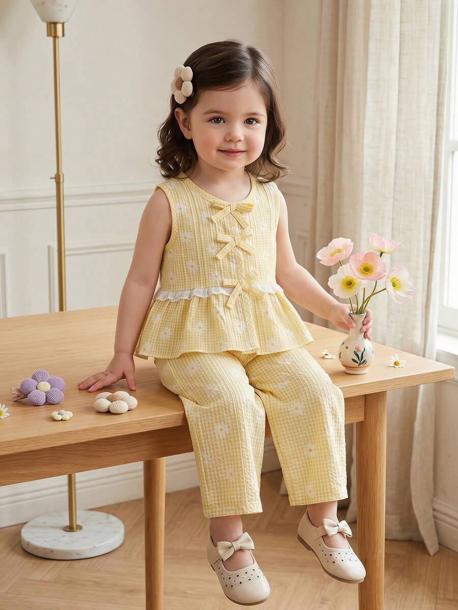 Souflis Souflis 2 piezas Conjunto de niña bebé con blusa de cuello redondo sin mangas plisada de color amarillo claro, top con decoración de lazo y pantalón de cintura elástica, cómodo y lindo para primavera, verano y otoño - Amarillo - Ver 1