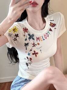 Joudiya 春夏休闲街头风白色T恤，花卉字母印花，音乐节和度假风短袖T恤，女款图案T恤 - 白色 - 查看 9