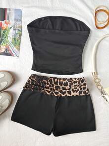 SHEIN Bộ đồ thể thao tối giản, thoải mái, co giãn, màu trơn dành cho bé gái tuổi teen gồm áo tank top và quần short in họa tiết da báo với cạp quần tương phản, màu đen. - màu đen - Xem 2