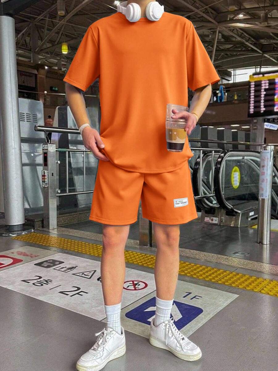 SHEIN 2件套青少年男童休闲宽松舒适logo装饰短袖上衣和短裤套装,适合春夏穿着 - 橘色 - 查看 1