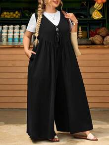 SHEIN CURVE+ Mono sin mangas con bolsillos con lazo delantero para mujer de talla grande, corte holgado - Negro - Ver 7