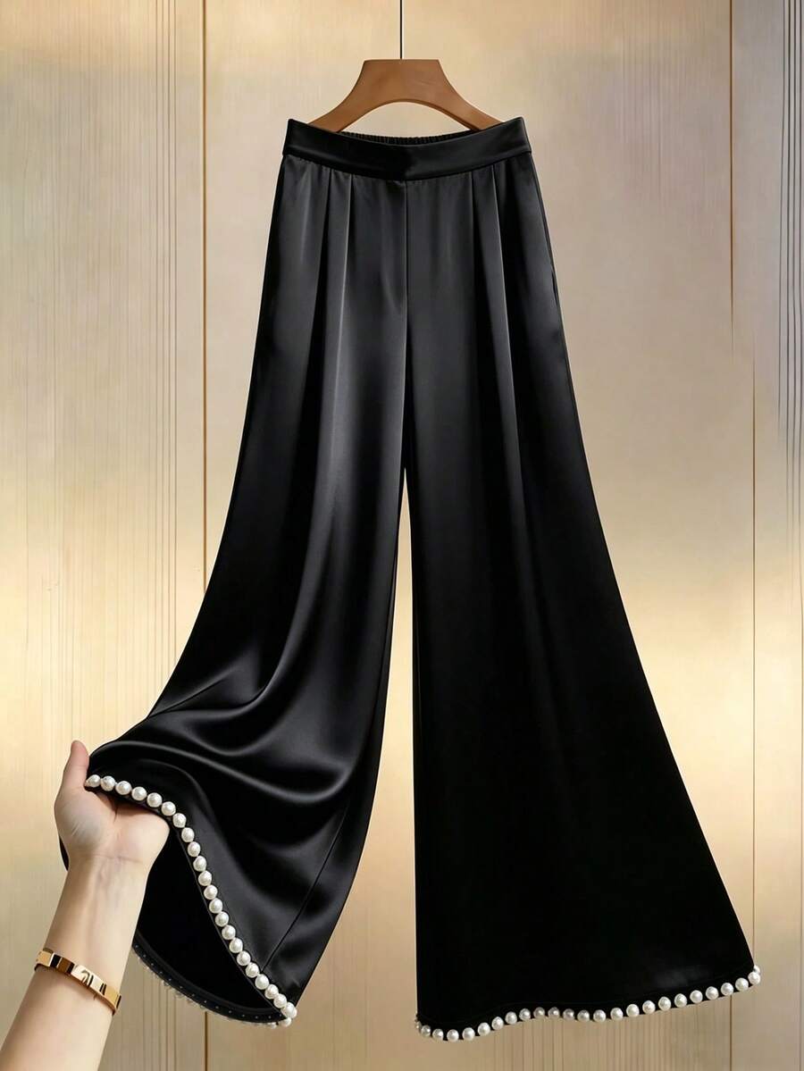 SHEIN Franclia Quần ống rộng cạp cao chất liệu satin màu vàng sâm panh, viền gấu đính ngọc trai, kiểu dáng thường ngày phù hợp cho tiệc tùng, công sở và nhiều dịp khác, tôn dáng và thanh lịch, chất liệu satin mềm mại, sang trọng. - màu đen - Xem 1