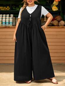SHEIN CURVE+ Mono sin mangas con bolsillos con lazo delantero para mujer de talla grande, corte holgado - Negro - Ver 8