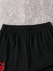 SHEIN 1 pieza Pantalones cortos con cordón en la cintura y gráfico de figura simple para niño preadolescente, adecuado para la escuela y uso primaveral - Negro - Ver 4