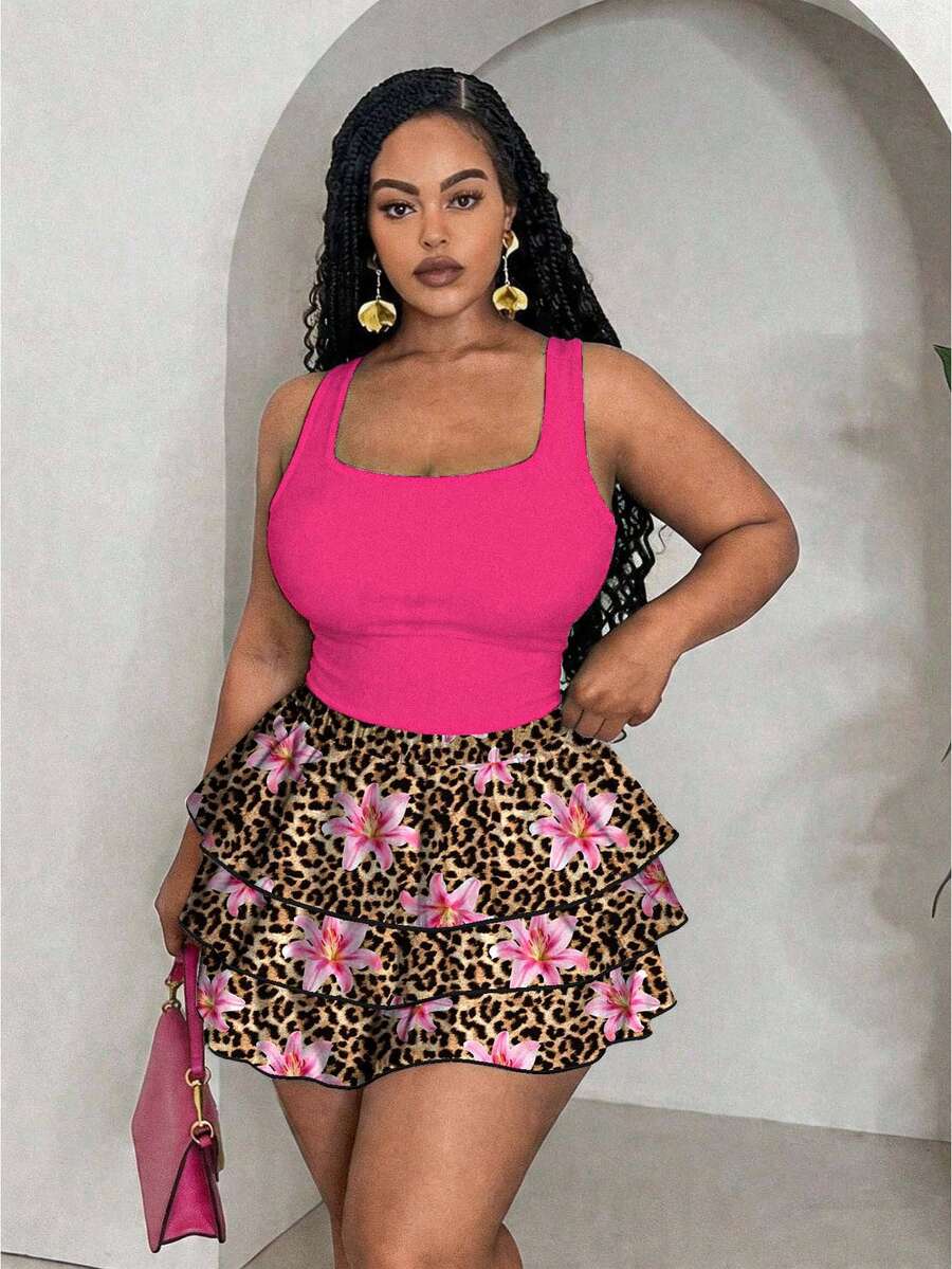 Slaydiva Bộ đồ 2 món dành cho nữ cỡ lớn: Áo tank top màu trơn và chân váy midi họa tiết hoa báo.