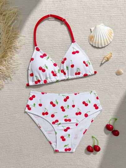 SHEIN Bộ bikini hai mảnh in hình quả anh đào nhiều màu sắc dễ thương dành cho bé gái tuổi teen, kiểu dáng cổ yếm, cổ chữ V sâu, gồm áo và quần tam giác, thời trang thanh lịch, phù hợp cho bơi lội, kỳ nghỉ hè, bãi biển, hồ bơi và các bữa tiệc ngày lễ.