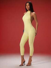 Bộ jumpsuit lửng cổ cao hở lưng thời trang gợi cảm, kiểu dáng ôm sát, ôm chân. - Vàng nhạt - Xem 4