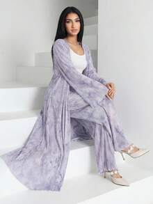 Bộ 2 món gồm áo dài tay in họa tiết toàn thân và quần cạp chun cho nữ. - Nhiều màu - Xem 1