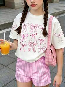 两件套少女休闲宽松圆领短袖T恤和短裤，可爱蝴蝶结印花搭配条纹宽松短裤。充满夏日气息，适合外出，春夏穿搭。 - 粉色 - 查看 1