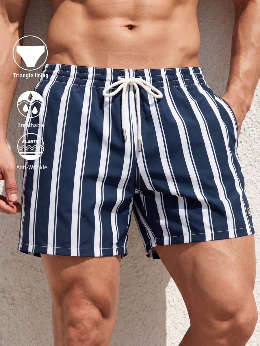 Manfinity Swimmode Pantalones cortos de playa con estampado a rayas para hombres, vacaciones - Azul Marino - Ver 1