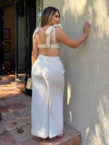 Maria Perezxox 海滩新款春夏休闲度假蝴蝶结肩带裹胸心形领短款上衣+阔腿超长裤杏色女两件套Se，纹理面料材质 - 杏色 - 查看 2