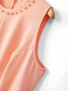GlowEve CURVE Conjunto de 2 piezas talla grande para mujer: Elegante chaqueta de cárdigan de manga larga con escote en V y adorno de perlas en contraste, y vestido largo con cuello redondo y decoración de perlas, adecuado para otoño/invierno, uso casual, trabajo y ocasiones - Naranja Coral - Ver 3